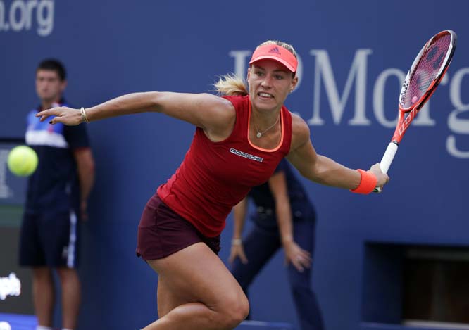 Angelique Kerber of Germany chases down a shot from Victoria Azarenka of Belarus during the third round of the US Open tennis tournament on Saturday.