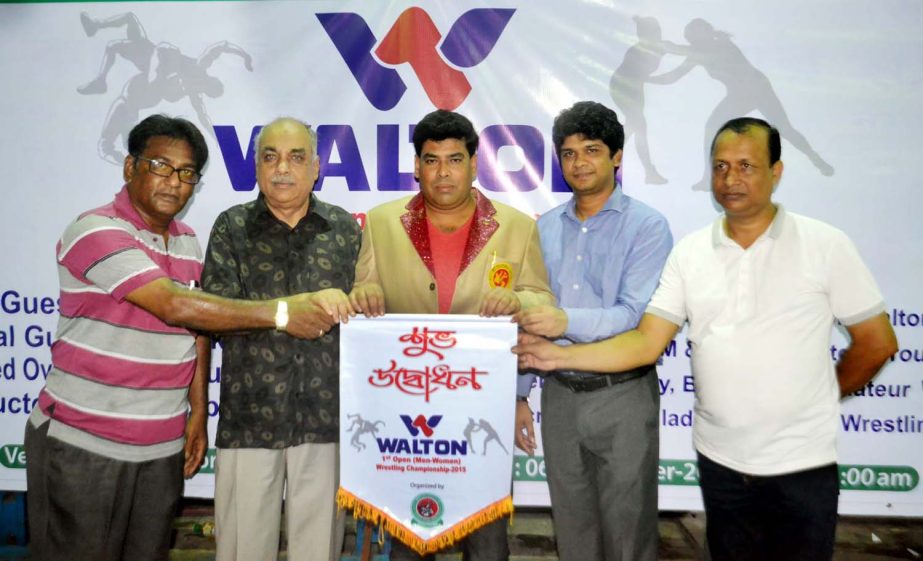 Vice-President of Bangladesh Amateur Wrestling Federation and First Senior Additional Director of Walton FM Iqbal Bin Amwar Dawn (center) inaugurating the Walton 1st Open Wrestling Championship as the chief guest at the Gymnasium of National Sports Counci