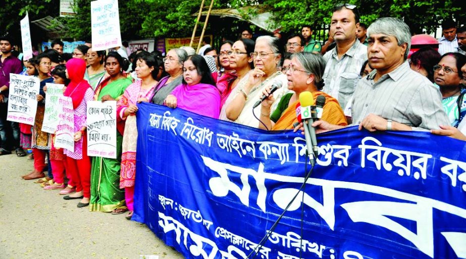 Samajik Protirodh Committee formed a human chain in front of the Jatiya Press Club on Monday with a call to keep minimum 18 years for marriage of daughter child in Early Marriage Resistance Law.