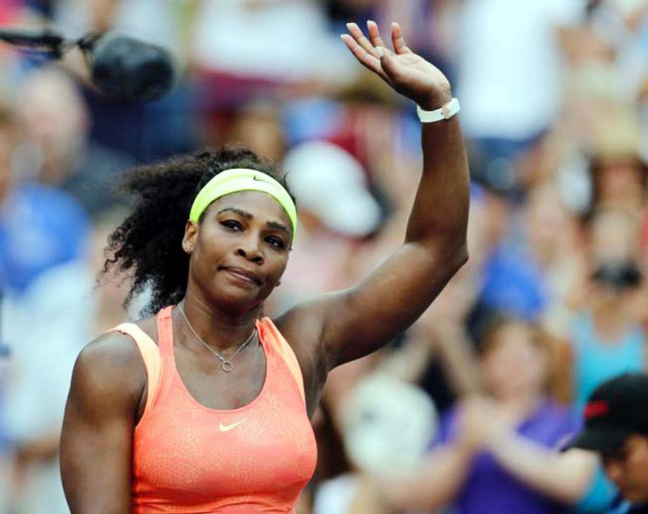 Serena Williams of the United State, waves to fans after winning her match with Madison Keys of the United States during the fourth round of the US Open tennis tournament on Sunday.