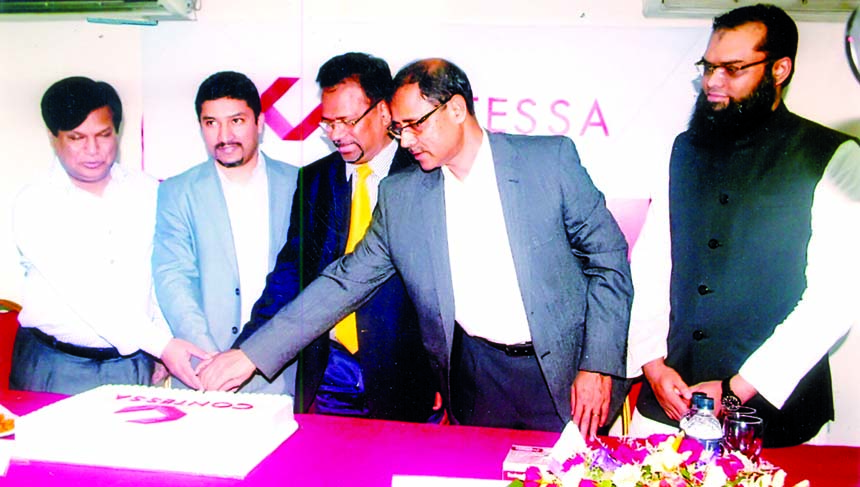 Shamim Ahsan, President of Bangladesh Association of Software & Information Services (BASIS) unveiling logo of Contessa Solutions & Consultants Ltd in the city on Sunday. Managing Director of the company Md Lutfor Rahman, CTO Forum President Tapan Kanti