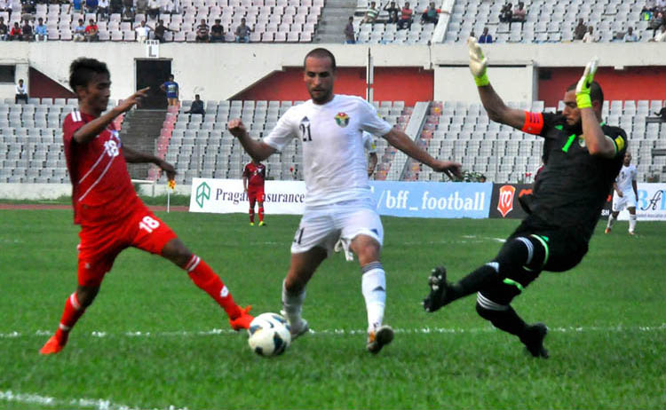 An action from the match of the FIFA World Cup Qualifiers between Jordan and Bangladesh at the Bangabandhu National Stadium on Tuesday.