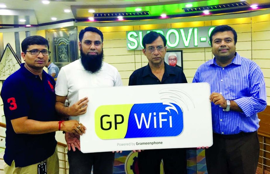 Reaz-Ul-Kabir, Director of Surovi group, inaugurating WiFi service in Surovi-9 launch recently. Business class passengers of the Dhaka-Barisal route service will use Internet availing WiFi connectivity provided through Grameenphone's 3G device.