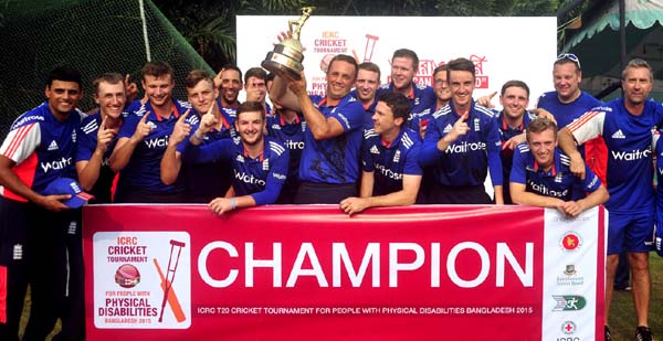 Players of England celebrate with the trophy of the ICRC International T20 Cricket Tournament beating Pakistan by 19 runs in the final at Bangladesh Krira Shikkha Pratishthan (BKSP) ground-3 in Savar on Thursday.