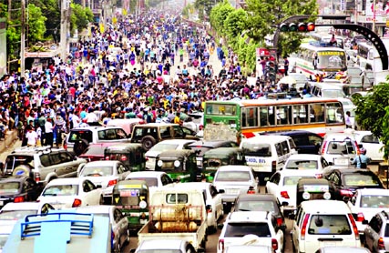Private University students blocked different city streets for the second day protesting imposition of VAT on the tuition fees causing massive traffic gridlock. This photo was taken from Dhanmondi Road-27 area on Thursday.