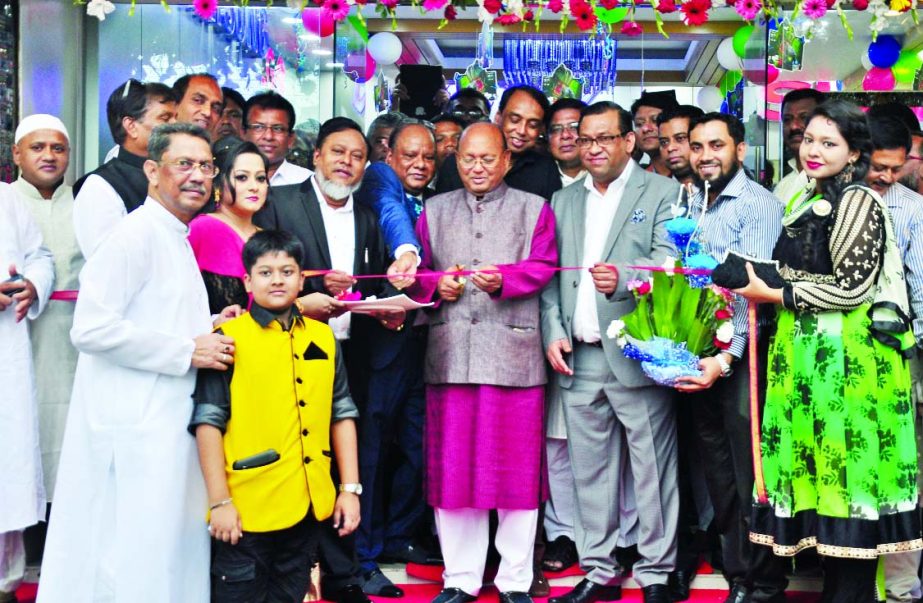 Commerce Minister Tofail Ahmed, inaugurating a outlet of "High Fashion Electronics" at Gulsan-1 in the city on Friday. Dhaka club president Khairul Majid Mahmud, Din Group Chairman Gani Ahmed and Ranguli group Chairman Nasir Hossain were present as spec