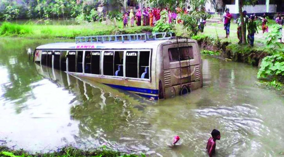 A bus carrying about 50 passengers skidded into roadside ditch near Gangair Market at Madhupur in Tangail leaving some persons were injured on Friday.
