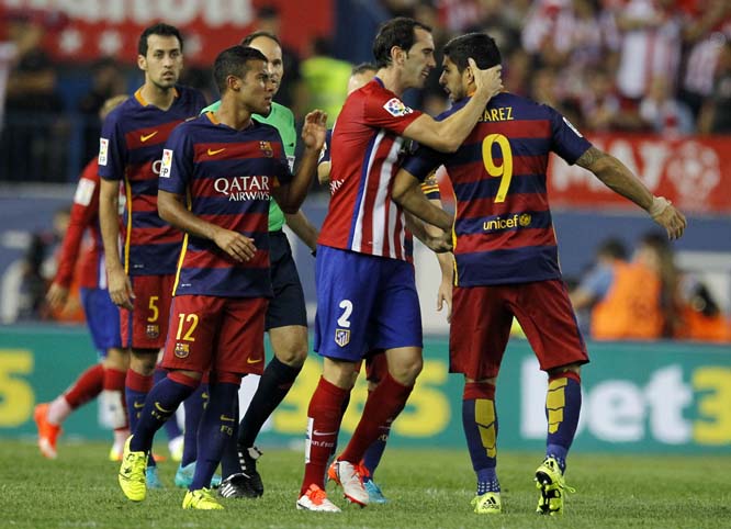 Suarez argues during a Spanish La Liga soccer match between Atletico Madrid and Barcelona at the Vicente Calderon stadium in Madrid, Spain on Saturday.