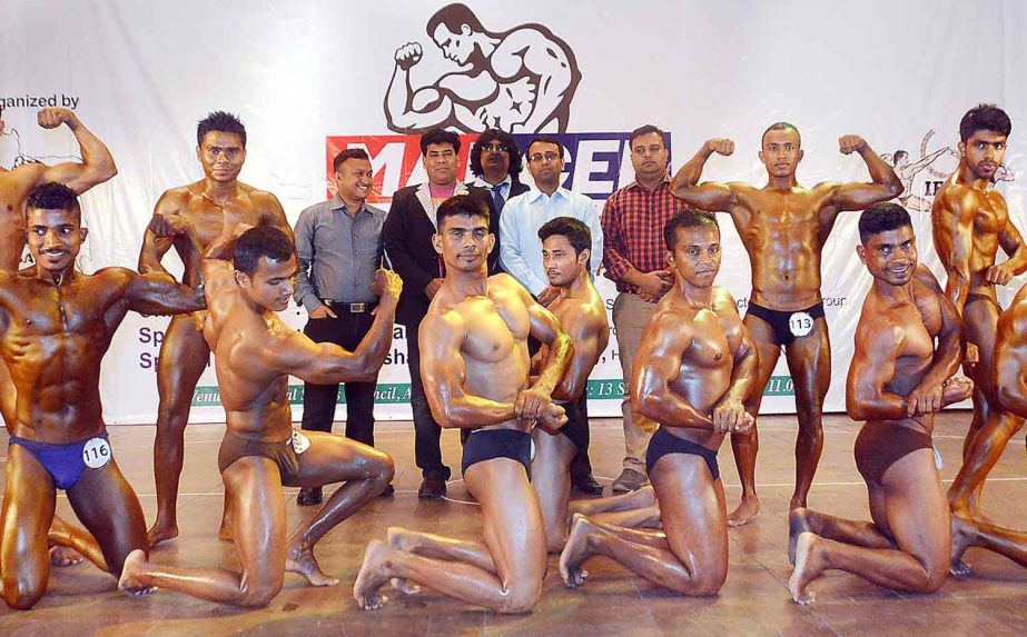 The participants of the Marcel Cup Open Bodybuilding Competition and the guests and officials pose for a photograph at the Auditorium of National Sports Council Tower on Sunday.