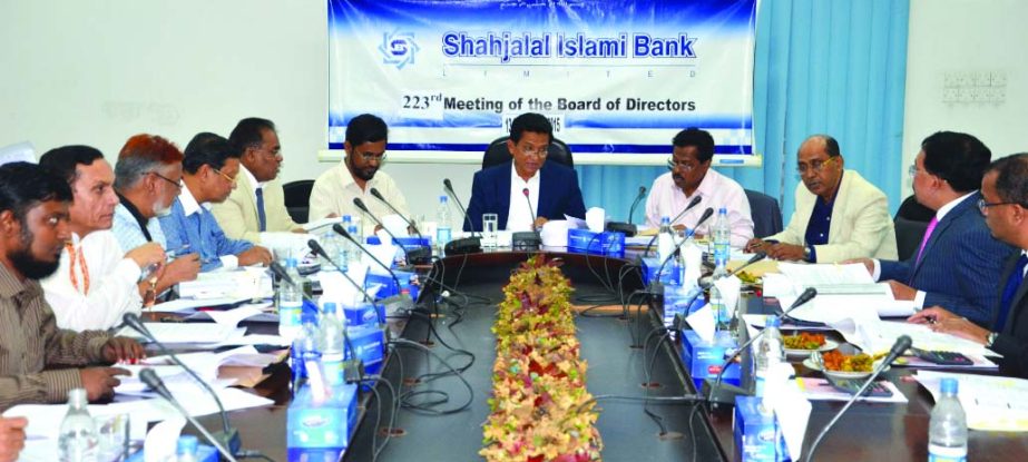 AK Azad, Chairman of the Board of Directors of Shahjalal Islami Bank Limited, presiding over the 223rd board meeting at its board room recently.