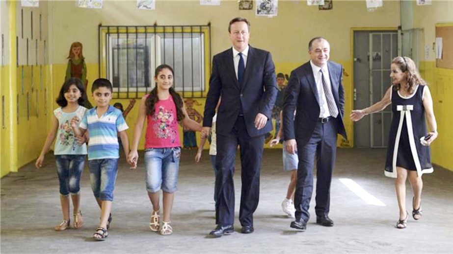 David Cameron met several refugees at the camp in the Bekaa Vally on Monday .