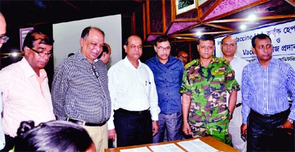 Chairman of Bangladesh Rural Electrification Board (BREB) Brig Gen Moyeen Uddin, among others, at Hepatitis 'B' vaccination programme held recently at BREB.