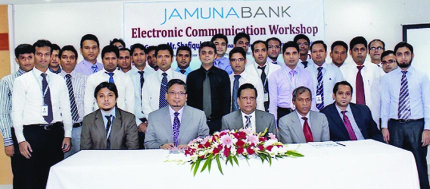 Shafiqul Alam, Managing Director of Jamuna Bank Ltd, poses with the participants of "Electronic Communication Workshop" at its training academy Tuesday.
