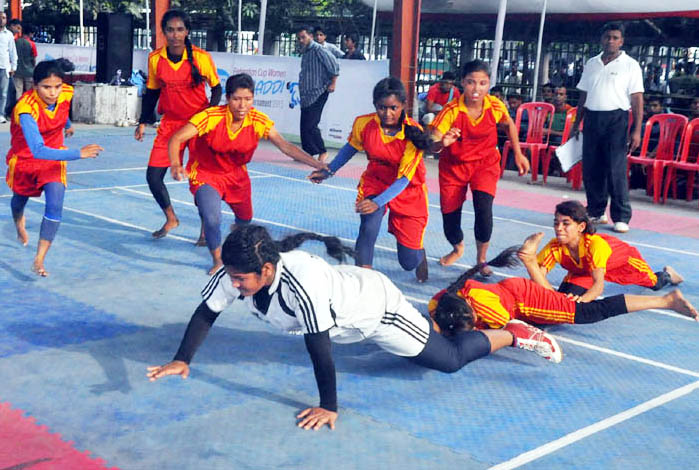 A moment of the Aarong Dairy Federation Cup Women Kabaddi Tournament between Dhaka Wanderers Club and Azad Sporting Club at the Kabaddi Stadium on Wednesday.