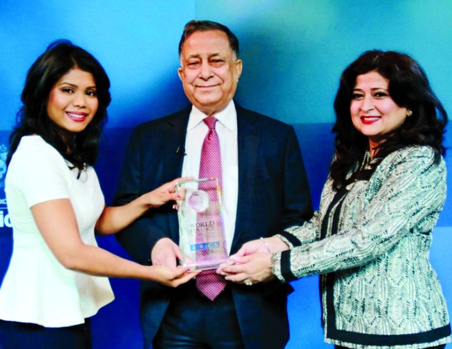 Farzana Chowdhury, Managing Director and CEO, and Nasir A Choudhury, Advisor of Green Delta Insurance Company Limited, receiving "World Finance Award-2015" on behalf of the company from a high official of World Finance at London Stock Exchange recently.