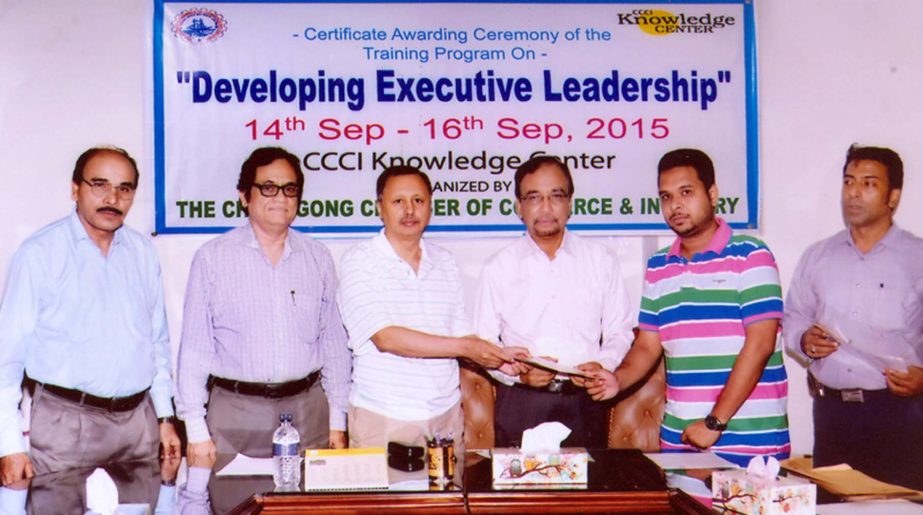CCCI President Mahabubul Alam distributing certificates among the participants of a training course on Developing Executive Leadership at Chamber Auditorium recently.