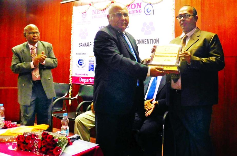 Prof. Dr. Muhammad Mahboob Ali is receiving MTC Global Award for Excellence-2015 as Outstanding Management Teacher from Prof. Bhushan Dewan at Bangalore, India recently.