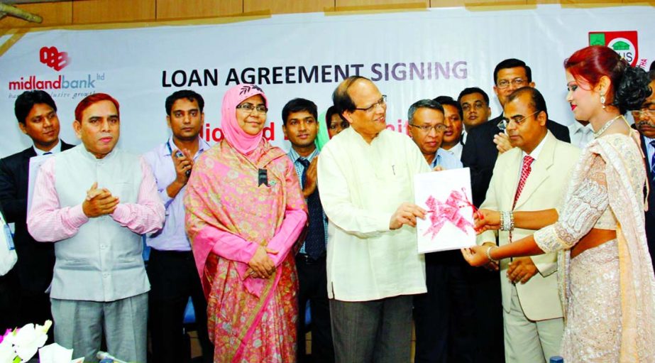 Bangladesh Bank(BB) Governor Dr Atiur Rahman is presenting at the Agreement Signing ceremony between Midland Bank and Palli Karma-Sahayak Foundation (PKSF) at BB conference room recently.
