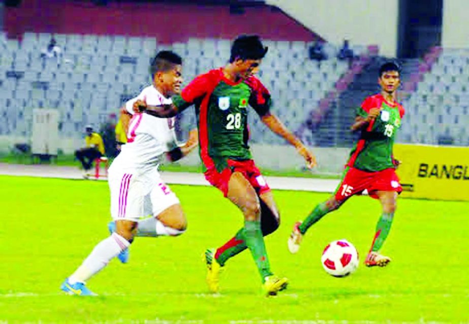 A scene from the football match of the AFC Under-16 Qualifiers between United Arab Emirates (UAE) and Bangladesh at the Bangabandhu National Stadium on Friday.