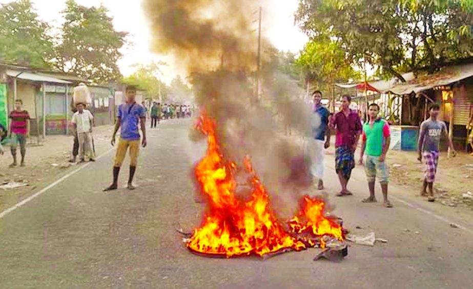 The angry mob locked in a clash with the law enforcers on Friday following alleged assault on a mother and her son at Kalihati in Tangail. They also blocked Dhaka-Tangail highway setting fire on tyres and other substances.