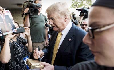 Donald Trump arrives at a campaign event in Rochester, New Hampshire.