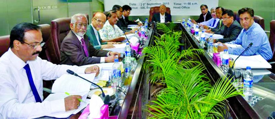 Kazi Akram Uddin Ahmed, Chairman of the Board of Director of Standard Bank Ltd, presiding over the 242nd Board Meeting at its boardroom on Sunday. Md Nazmus Salehin, Managing Director of the bank was present.