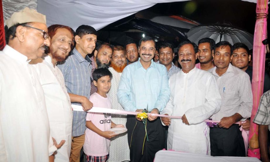 CCC Mayor AJM Nasir Uddin inaugurating temporary cattle market at Saltgola Labour colony field in the city yesterday.