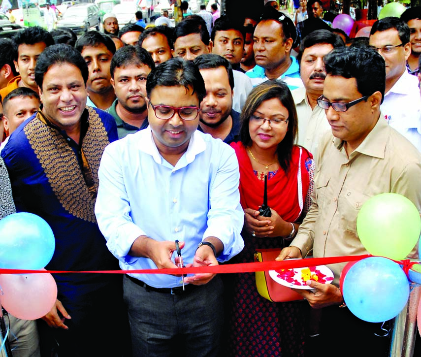 Mayor of Dhaka South City Corporation Md. Sayeed Khokan opening newly built foot-overbridge at Shaheed Captain Monsoor Ali Sarani (Baily Road crossing) on Sunday.