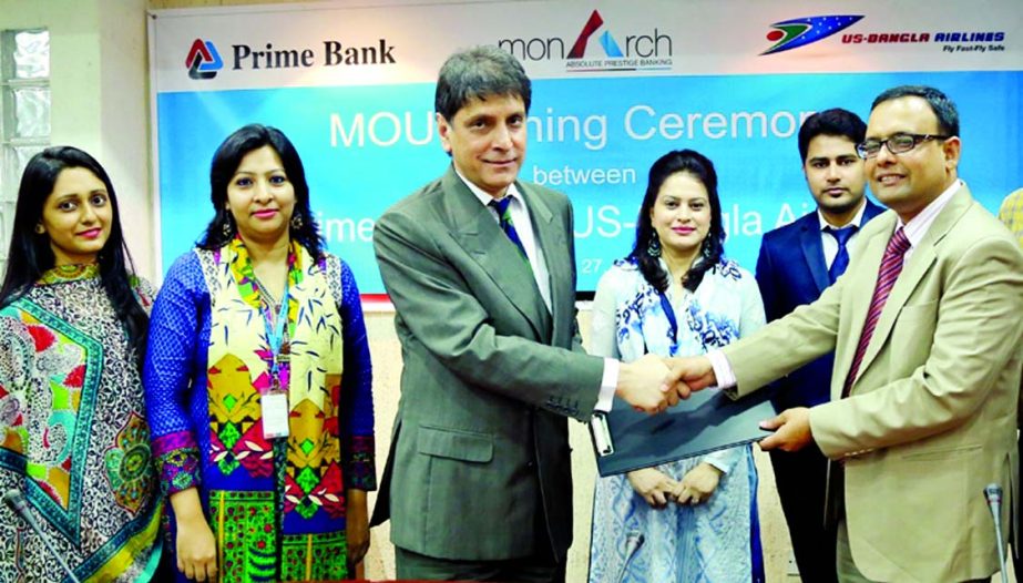 M Rashed, SEVP of Prime Bank Ltd and Md Shafiqul Islam, head of marketing and sales of Us-Bangla Airlines sign a MoU at the bank's head office recently. Under this agreement, the bank's customers and platinum debitcredit cardholders will get special pr