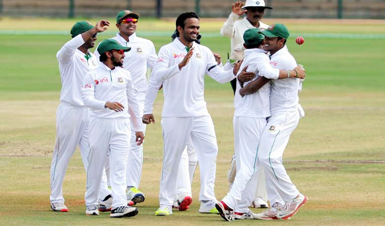 Players of Karnataka celebrate after taking a wicket of Bangladesh A team on the first day of the three-dayer match between Karnataka and Bangladesh A team at Mysore in India on Tuesday.