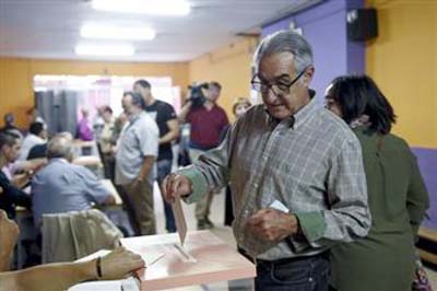 A voter casting vote in Catalonia, Spain on Sunday.