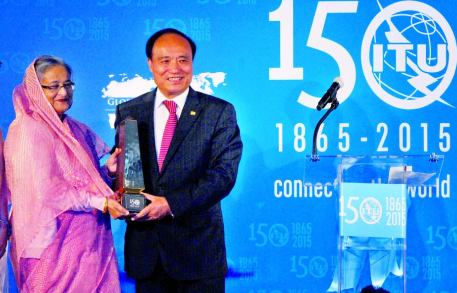 Prime Minister Sheikh Hasina receiving ITU Sustainable Development Award from its Secretary-General Houlin Zhao at UN HQ in New York on Saturday.