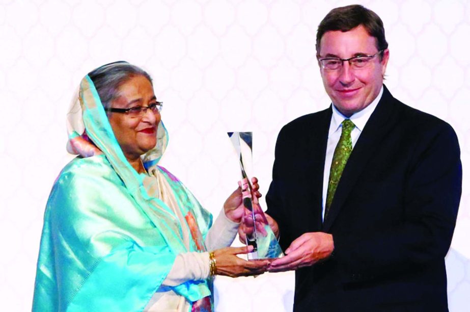 Prime Minister Sheikh Hasina receiving United Nations Environment Award in New York on Sunday for her contribution in protecting environment.