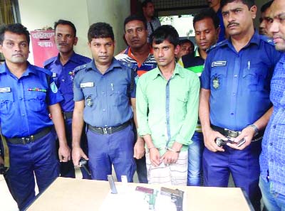 KISHOREGANJ: Police arrested listed criminal Owis Uddin Santu with a foreign pistol, bullets and two magazines from Nagua Battala area in Kishoreganj town on Monday.