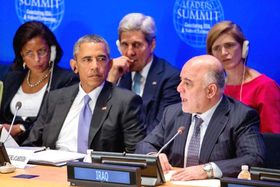 President Barack Obama, accompanied by, rear, from left, National Security Adviser Susan Rice, Secretary of State John Kerry, and U.S. Ambassador to the United Nations Samantha Power, right, listens as Iraqi Prime Minister Haider al-Abadi, second from rig