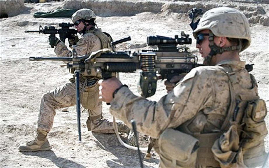 Photo shows NATO-led international troops stationed in Afghanistan at a combat mission against Taliban-led insurgency.