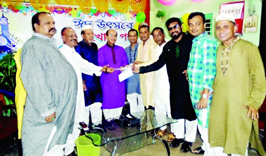 FENI: Media Adviser to Prime Minister Sheikh Hasina Iqbal Sobhan Chowdhury receiving membership form from the office-bearers of Feni Press Club as No 1 member of the Club on Friday last .
