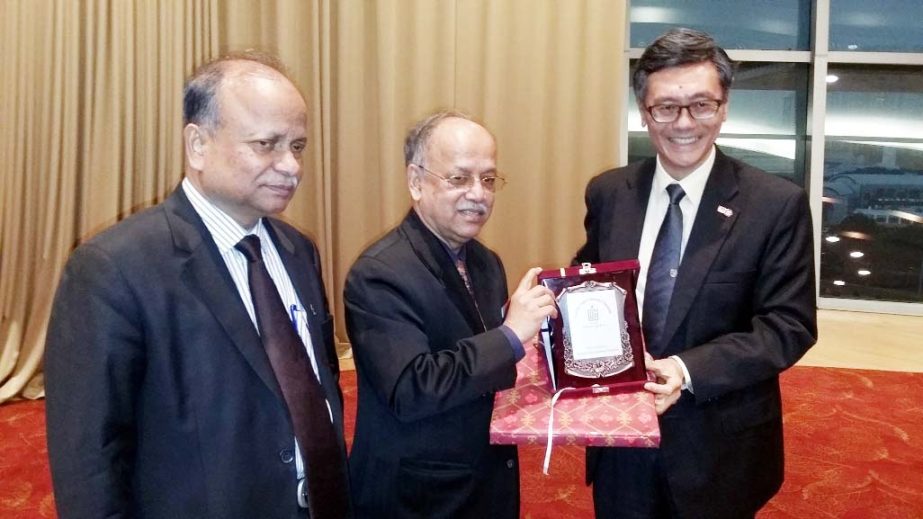 Chairman of University Grants Commission, Bangladesh Prof Abdul Mannan is seen with the Provost of National University of Singapore Prof Tan Eng Chye at the University's Conference Hall on Monday.