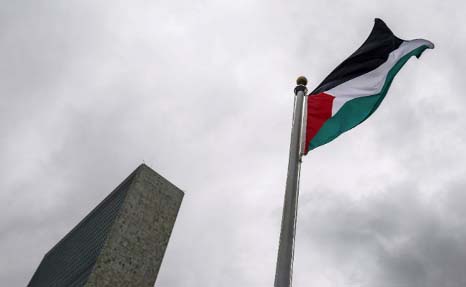 The Palestinian flag flies after being raised by Palestinian President Mahmoud Abbas in a ceremony outside the United Nations.