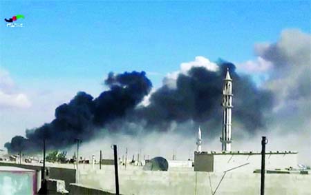 Smoke rises after airstrikes by military jets in Talbiseh of the Homs province, western Syria. Internet photo