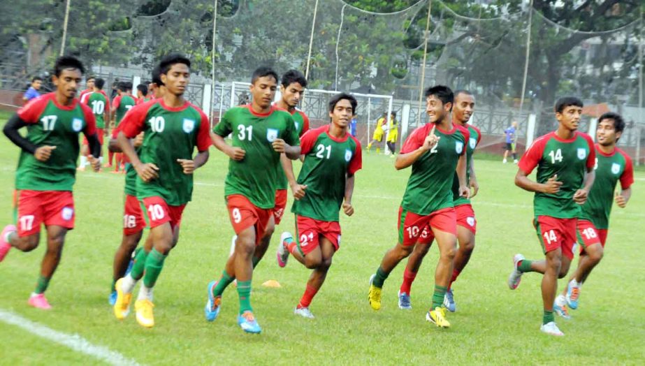 Players of Bangladesh Under-19 Football team during the practice session at the Abahani Limited Ground on Saturday.