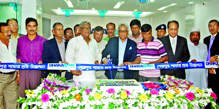 Abdul Hai Sarker, Founder Chairman of Dhaka Bank Ltd, inaugurating its 83rd Sherpur branch at Bogra on Sunday. Founder Vice Chairman ATM Hayatuzzaman Khan, Directors Altaf Hossain Sarker, Mohammed Hanif and Md Amirullah, Managing Director Niaz Habib and D