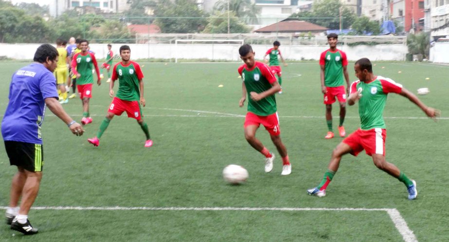 Players of Bangladesh Under-19 football team playing football during their practice session at the BFF Artificial Turf on Monday.