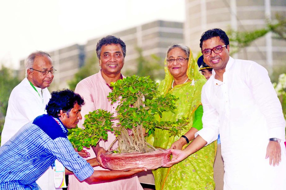 Dhaka South and North City Corporations jointly accorded a civic reception to Prime Minister Sheikh Hasina at South Plaza of Sangsad Bhaban on Monday for achieving Champions of the Earth and ICT Sustainable Development Award of United Nations.