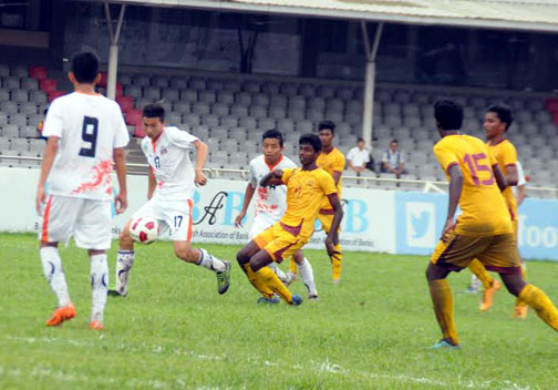 An action from the match of the AFC Under-19 Championship Qualifiers between Sri Lanka Under-19 Football team and Bhutan Under-19 Football team at the Bangabandhu National Stadium on Tuesday. Sri Lanka won the match 2-0.