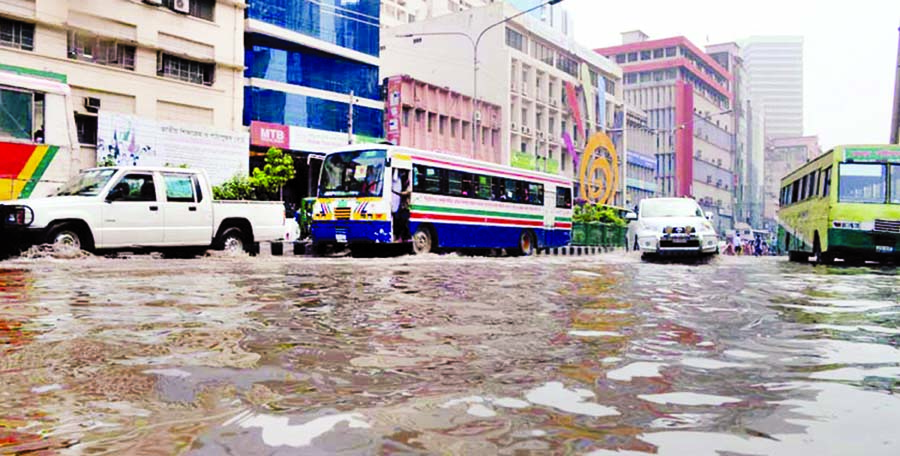 Streets of city's Motijheel Commercial Area were inundated after short spell of rain on Tuesday.