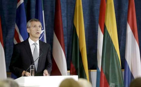 NATO Secretary General Jens Stoltenberg speaks during a media conference at NATO headquarters in Brussels on Thursday.