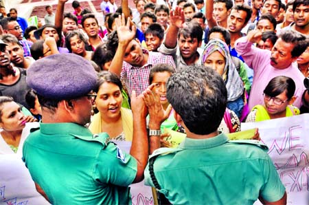 Medical admission-seekers continue sit-in protest in front of Central Shaheed Minar on Thursday reiterating their demand for fresh test amid mild police resistance on Thursday.