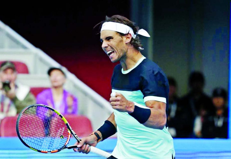 Rafael Nadal of Spain reacts after defeating Jack Sock of the United States in men's singles quarterfinal match of the China Open tennis tournament at the National Tennis Stadium in Beijing on Friday.