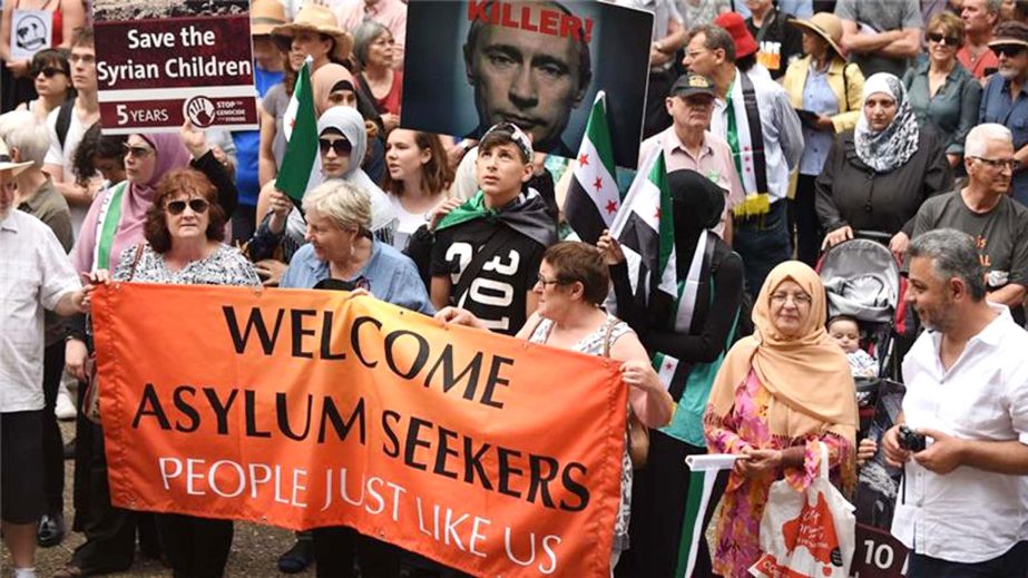 Protesters staged a rally in support of refugees and asylum seekers in Sydney on Sunday.